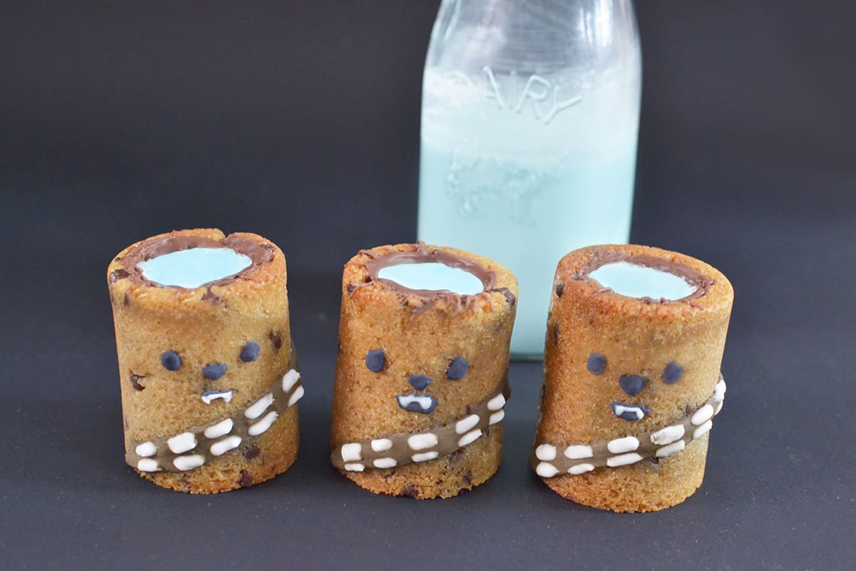 Wookiee Cookie Cups with Blue Milk, served alongside a bottle of blue milk—an out-of-this-world Star Wars Galaxy’s Edge treat.