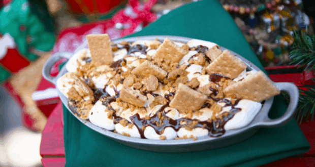 S'mores dip inspired by Big Thunder Ranch Barbecue at Disneyland, loaded with graham crackers, gooey marshmallows, and chocolate.