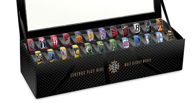 NBA team-branded MagicBand wristbands in a display box, ready to celebrate your fandom at Disney’s NBA Experience. Pre-order now!.
