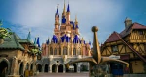 Cinderella Castle gleams at Disney World, with the iconic Sword in the Stone inviting guests to try their luck out front.