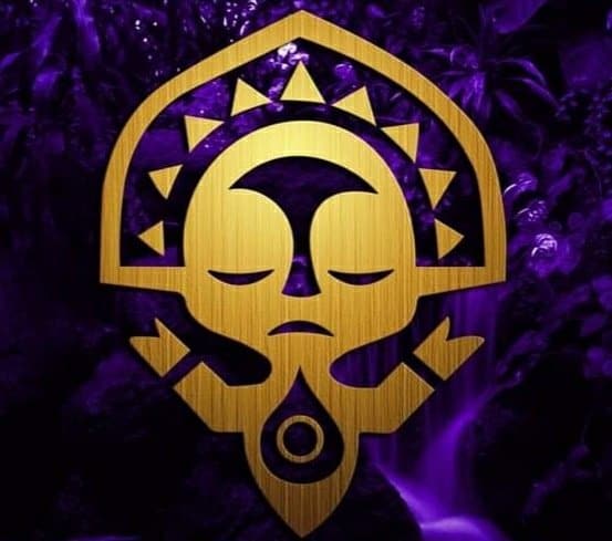 A radiant gold mask with closed eyes and sunburst rays, set on a deep purple abstract backdrop, capturing the magical, tropical style found at Disney’s Polynesian Village Resort.
