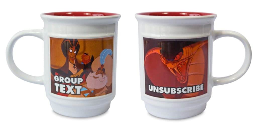 Two white mugs decorated with playful cartoon art and the phrases “GROUP TEXT” and “UNSUBSCRIBE” channel the laughter of your favorite Disney park moments. Designed for fans who love both memes and magical memories, these mugs add a touch of internet-inspired humor to any entertainment collection—straight from the whimsical world of shopDisney.