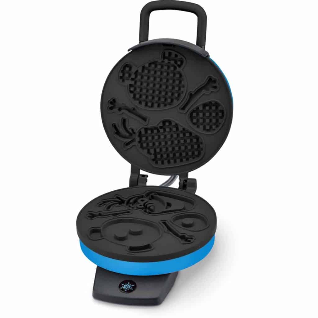 Open black waffle maker featuring whimsical snowman and snowflake molds on its plates, evoking the magical wintery charm of Disney parks and reminiscent of the beloved Olaf Waffle Maker found at Walmart for just $20.