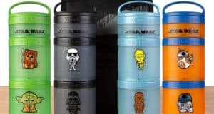 Four stacks of vibrant Star Wars snack containers featuring fan-favorite characters by Whiskware on display at a themed dining area, perfect for Star Wars fans visiting the park.
