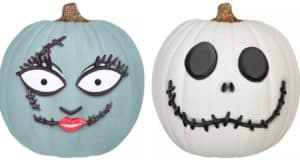 Two show-ready pumpkins styled with Target’s No Carve Pumpkin Kits—one with oversized eyes and bold red lips adding a playful twist, the other channeling Jack Skellington from The Nightmare Before Christmas with stitch-like smiles and round black eyes, perfect for a Halloween-themed park display.