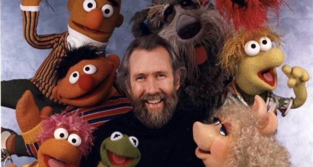 A cheerful guest joins beloved Muppets like Kermit and Miss Piggy at a lively Sesame Street celebration, honoring Jim Henson’s birthday with a colorful, heartwarming tribute.