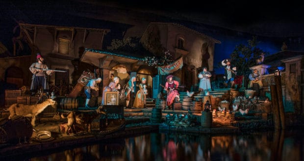 Pirate animatronics bring the bustling Caribbean village scene to life at Disneyland, surrounded by townspeople, animals, and barrels along moonlit waters. This iconic Pirates of the Caribbean setting creates an immersive backdrop for unforgettable pirate-themed photos and swashbuckling fun on Talk Like A Pirate Day.