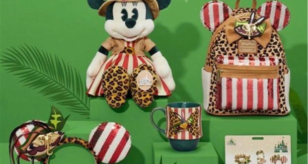 The Main Attraction Collection’s safari-themed Minnie Mouse plush, backpack, mug, mouse ears, and accessories are showcased on a vibrant green backdrop reminiscent of Disney’s Jungle Cruise adventure.