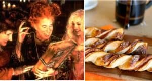 The Sanderson Sisters gather around a spellbook, surrounded by Pumpkin Broomstick Twists displayed on a wooden board, capturing the whimsical magic of Hocus Pocus for fans of themed Halloween entertainment.