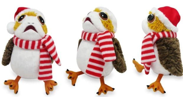 Holiday-themed Porg plush toys from Star Wars: Galaxy’s Edge wear festive red Santa hats and striped scarves, displayed from several angles against a bright white backdrop.
