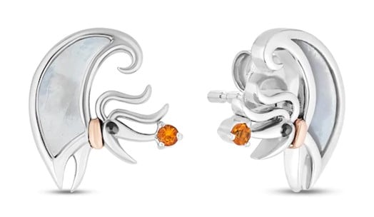 Silver earrings showcasing an abstract female face, highlighted by vibrant orange stones and delicate rose gold touches, capture the enchanting flair of Disney Treasures and the exclusive magic found in KAY Jewelers' collectible series beloved by theme park fans.