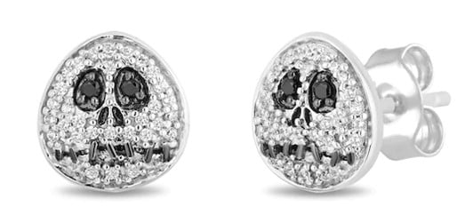 Skull-shaped silver stud earrings, sparkling with black and white stones to highlight the iconic facial features of Jack Skellington, make a standout accessory for fans exploring Disneyland’s Nightmare Before Christmas attractions. These Disney Treasures-inspired earrings bring Tim Burton’s whimsical world to life, perfect for completing your park outfit or taking home as enchanting souvenirs.