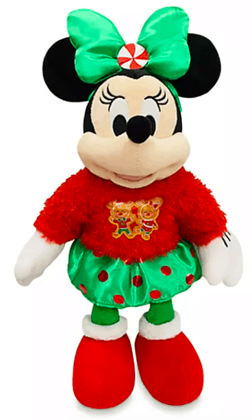 Celebrate the season with the Holiday Disney Plushes Minnie Mouse doll, dressed in a cheerful red sweater and green skirt, complete with Minnie's signature big green bow for that extra festive Disney Parks magic.