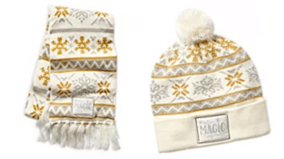 Add Disney magic to your winter wardrobe with this cream knit scarf and hat set from the Disney Parks Silver and Gold Collection, decorated with sparkling gold and gray snowflake patterns and featuring a “MAGIC” patch on each piece—must-have accessories for staying cozy during your next visit to the parks.