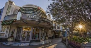 Elias & Company’s art deco facade on Buena Vista Street beams in the morning sun at Disneyland Resort, decked out in festive holiday garlands and framed by lush trees—a picture-perfect start to shopping and dining adventures right inside Disney California Adventure Park.