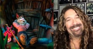 Brer Rabbit greets fans by the door at Splash Mountain, joined by a cheerful man with long curly hair, possibly one of the attraction’s voice actors.