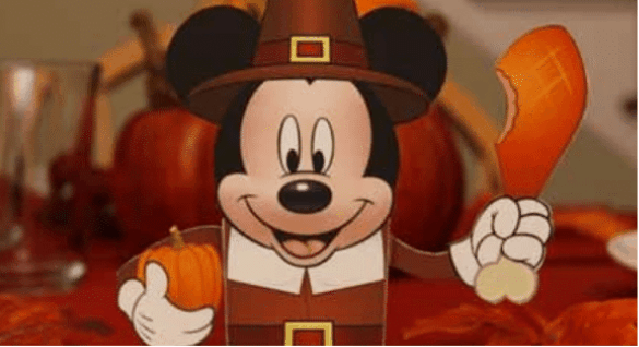 Mickey Mouse appears at Disney World dressed as a Thanksgiving Pilgrim, cheerfully holding a pumpkin and a savory drumstick. Festive pumpkins surround him in the background, making Mickey an irresistible holiday-themed candy holder perfect for your seasonal celebrations in the park.