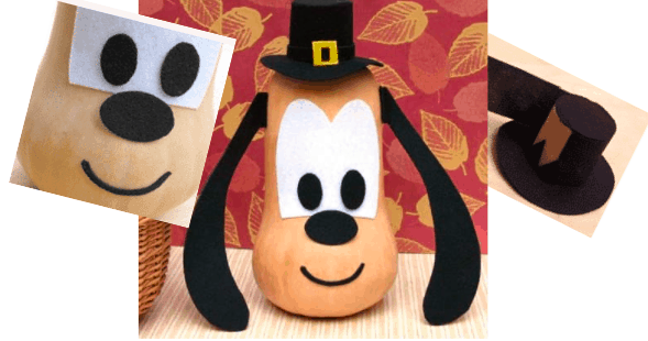 A festive gourd styled as Pluto, complete with his signature floppy ears and sporting a pilgrim hat, adds Disney’s trademark whimsy to Thanksgiving displays at the park; includes close-up shots of Pluto’s cheerful face and themed hat.
