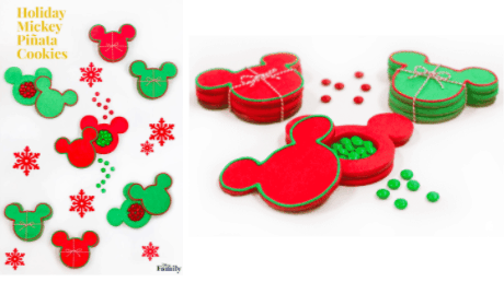 Festive Mickey-shaped holiday cookies in vibrant red and green, some bundled with string, topped with cheerful green candies and whimsical snowflake decorations—perfect for a magical Disney Parks treat.