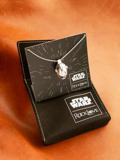 The Mandalorian Hover Pram necklace by RockLove, featuring adorable Grogu (The Child) in his iconic pod, showcased in a sleek black display box atop brown leather—perfect for Star Wars fans and collectors visiting Galaxy’s Edge.