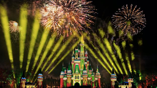 Brilliant fireworks and golden lights dazzle over Cinderella Castle at night, lighting up the sky as fans experience Minnie’s Wonderful Christmastime Fireworks virtually from Walt Disney World Resort during a magical holiday celebration.