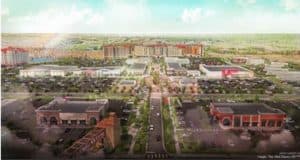 Aerial view of Flamingo Crossings, Disney’s vibrant shopping and entertainment district featuring expansive parking lots, popular retail stores, dining venues, and hotels—offering a new gateway experience for guests visiting Walt Disney World Resort.