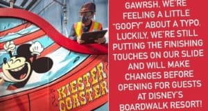 A Cast Member stands beside the Boardwalk slide at Disney’s BoardWalk Resort, where the sign amusingly displays a “Keister Coaster” typo instead of “Keister.” An apology from Disney Imagineering is featured on the right, acknowledging the oversight to park guests.