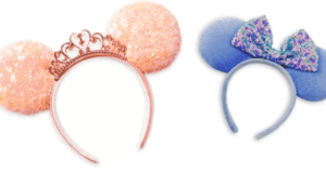Magical headbands for Disney park-goers: a peach design topped with a regal crown, and the new blue style featuring a shimmery purple bow and glittering Minnie Mouse Ears—an enchanting accessory for exploring your favorite attractions. Find them at ShopDisney to upgrade your Disney adventure look.