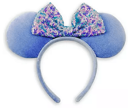 Magical light blue Minnie Mouse Ears headband featuring a dazzling blue, purple, and white sequin bow in the center, straight from shopDisney’s latest park-inspired collection—perfect for your next visit to Disneyland or Walt Disney World.