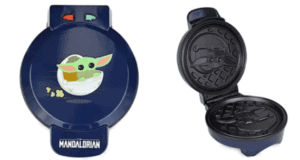 The Child Waffle Maker, inspired by Baby Yoda from The Mandalorian, sits both open and closed on display; the open version shows the detailed interior plates that shape each waffle into a fan-favorite character. Discover this magical kitchen gadget at shopDisney—an out-of-this-world treat for Star Wars lovers looking to bring a taste of Galaxy’s Edge to their own home.
