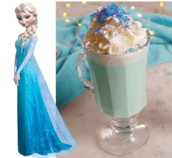 Elsa from Frozen poses beside a Frozen-themed icy blue drink topped with whipped cream and blue sprinkles, perfect for fans visiting the Disney Parks.