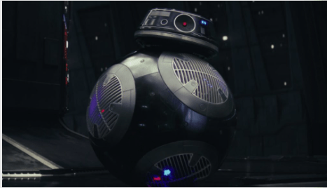 BB-9E from Star Wars stands ready in a shadowy, futuristic zone inspired by the Lego Star Wars universe, inviting theme park guests to hunt for cleverly hidden Easter Eggs throughout the immersive attraction.