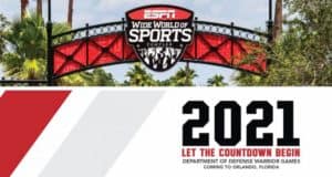 Welcome sign at ESPN Wide World of Sports Complex in Walt Disney World, featuring an announcement for the 2021 Warrior Games, a special event co-hosted with the Department of Defense.