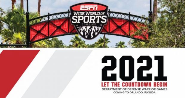 Welcome sign at ESPN Wide World of Sports Complex in Walt Disney World, featuring an announcement for the 2021 Warrior Games, a special event co-hosted with the Department of Defense.