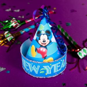 Ring in the New Year at Disney World with a Mickey-themed party hat adorned with festive ribbons, noisemakers, and shimmering confetti against a vibrant purple backdrop—ideal for fans eager to add some classic Disney DIY Hat magic to their celebration!.