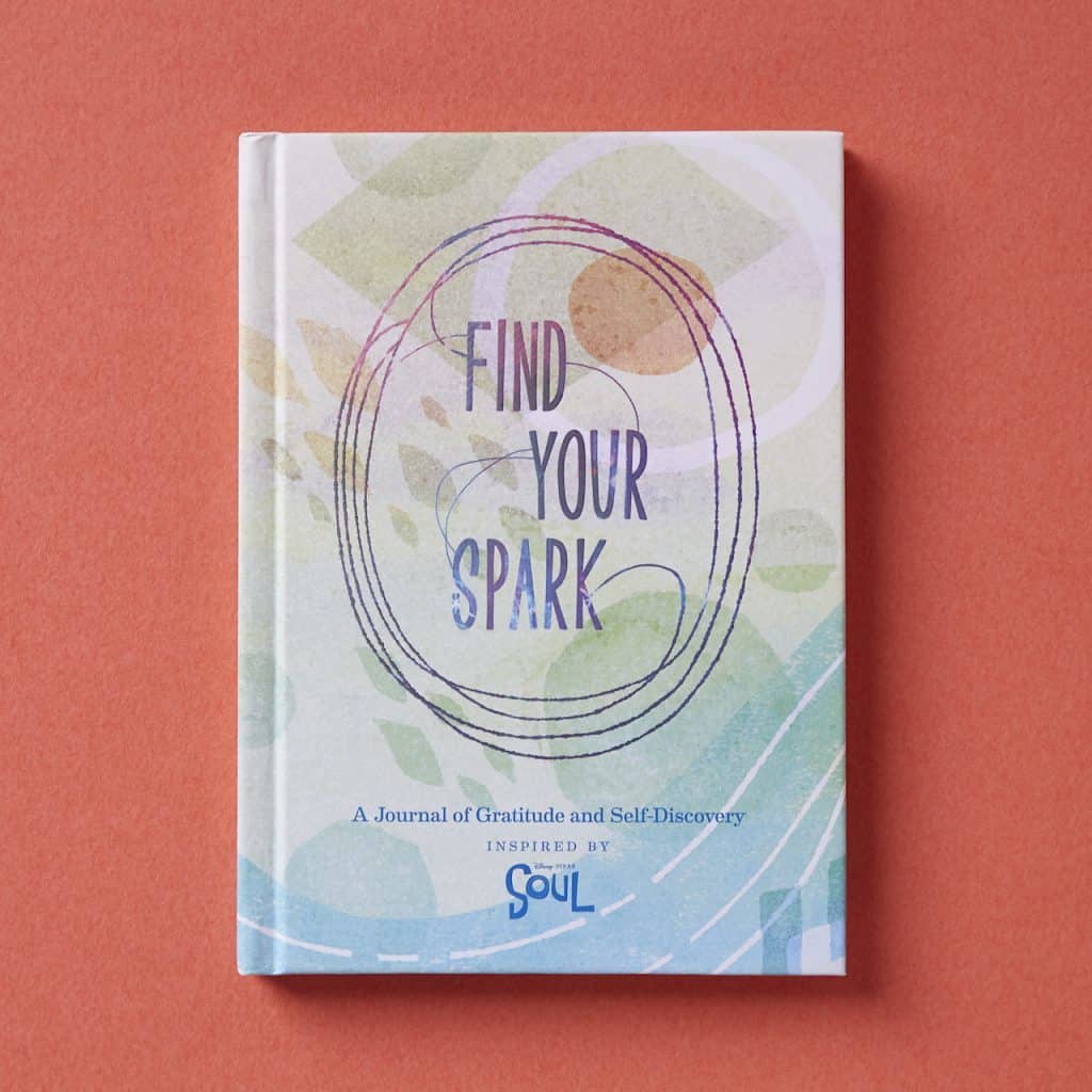 The "Find Your Spark" journal, decorated with abstract pastel artwork on a peach background, makes an ideal collectible for Disney Parks guests and Soul fans wanting to bring home exclusive Disney Soul merchandise from their visit.