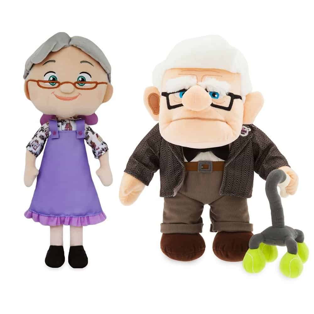 Carl and Ellie plush dolls from the Up plush bundle, featuring Carl with his glasses and walker and Ellie in her signature purple dress, available at shopDisney for Disney fans and collectors.