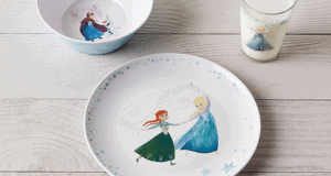Experience the enchantment of Arendelle at your own dining table with this Disney Frozen Tabletop Set from Pottery Barn, showcasing a bowl, plate, and glass featuring beloved characters Anna and Elsa, all displayed atop a light wooden surface reminiscent of magical moments at Disney parks.