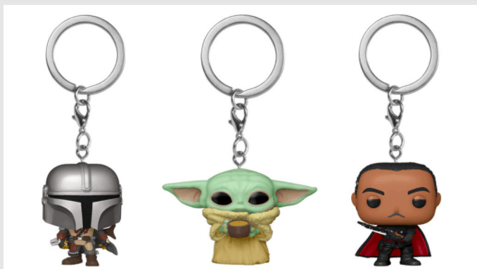 Star Wars Funko keychains featured at Funko Fair, including The Mandalorian, Grogu with his iconic soup bowl, and the caped, mustachioed Greef Karga—perfect souvenirs for fans exploring a galaxy of collectibles.