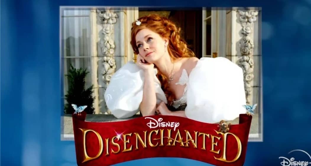 Giselle, dressed in her iconic white gown, gazes from a balcony with the "Disney Disenchanted" logo displayed below, announcing the highly anticipated return of Enchanted to Disney fans.