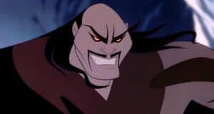 Animated character with fierce expression, long black hair, and arched eyebrows. Wearing dark clothing, they appear intense and are set against a dramatic background with swirling dark and light patterns.