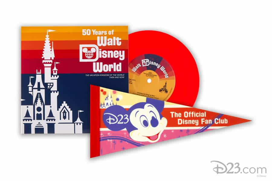 Red vinyl record from the Collector Set, a vibrant Disney castle album cover, and an exclusive D23 Mickey pennant—all celebrating Walt Disney World’s 50th anniversary. Perfect keepsakes for fans ready to commemorate this magical milestone!.