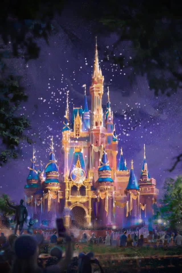 Cinderella Castle dazzles with blue spires and radiant lighting at night, as fans gather beneath a canopy of sparkling lights—a magical centerpiece showcasing Walt Disney World’s stunning Park Icon Transformation for the 50th Anniversary Celebration.