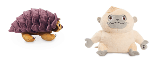 Raya & The Last Dragon plush toys featuring the brown Tuk Tuk with his signature purple shell and the white dragon Sisu, as seen in shopDisney’s exclusive merchandise collection.