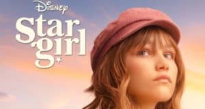 Disney Stargirl shines on a pastel sky backdrop, wearing her signature pink hat and radiating the whimsical, feel-good energy fans love from the Disney+ sequel.