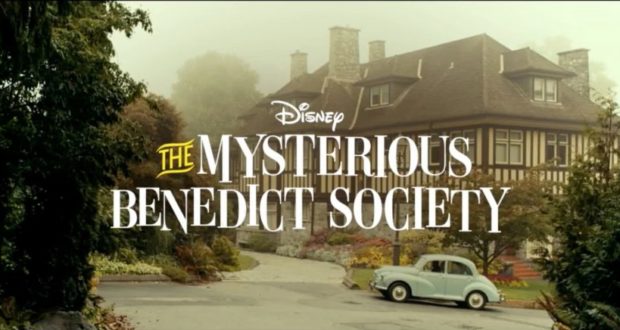 The Mysterious Benedict Society house shrouded in fog with a vintage car out front, evoking the intrigue of a Disney+ adventure now streaming for fans of immersive stories and family entertainment.