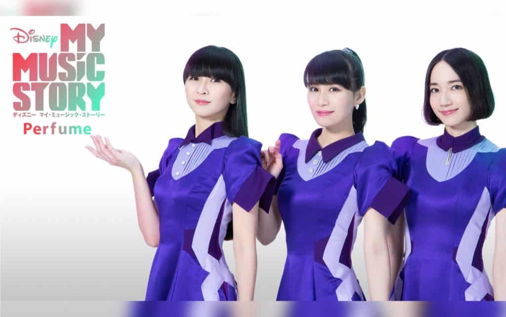 Three performers in coordinating purple dresses stand together in front of the Disney+ "My Music Story Perfume" logo, set against a bright white backdrop, bringing the excitement of Disney entertainment to life.