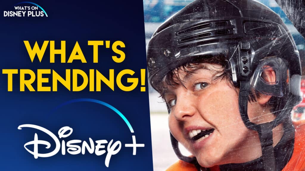 A young hockey player in full gear stands against a vibrant blue background featuring the "What's Trending! Disney+" banner, spotlighting this week’s must-see shows and entertainment on Disney+.