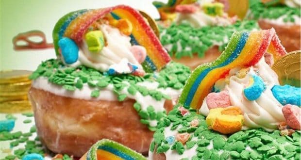 Shamrock Supreme Donut at Everglazed in Disney Springs, decked out with vibrant green sprinkles, rainbow candy pieces, shiny gold chocolate coins, and fluffy marshmallows for a magical St. Patrick’s Day treat that looks right at home in the heart of Disney magic.