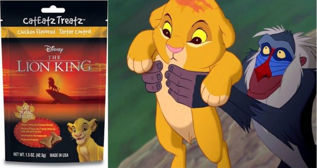 Lion King-themed treats are displayed next to Rafiki holding Simba in the iconic Pride Rock moment from Disney’s The Lion King.